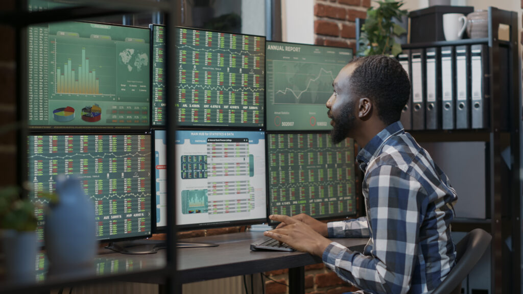 Happy investor celebrating forex exchange achievement